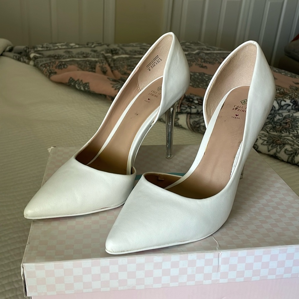 White pumps with rainbow filter bottom and clear heel